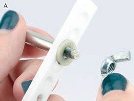 wing nut being screwed onto tool